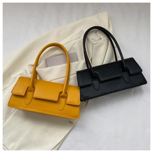 Minimalist rectangular baguette underarm bags in yellow and black matte leather finish