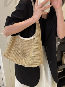 Women's woven straw hobo bag with beige leather trim and large capacity for summer travel