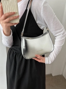 Fashionable silver metallic mirror underarm bag with Fashion & Bags lettering