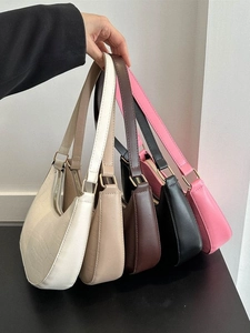 Fashionable women's faux leather crescent bags in various colors with crocodile texture
