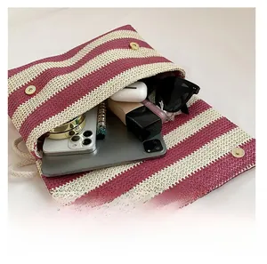 Top view showing large capacity for tablet and cosmetics in striped woven tote bag