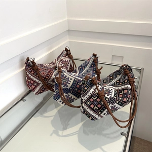 Ethnic geometric pattern knit hobo bags with leather handles in three color variants