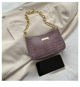 Purple faux leather shoulder bag with crocodile texture and gold chain strap detail