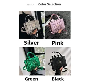 Glossy crocodile embossed mini handbag in silver, pink, green, and black leather colors