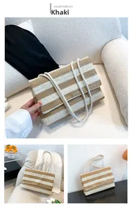 Detail of khaki striped woven tote bag with white rope straps on a modern sofa