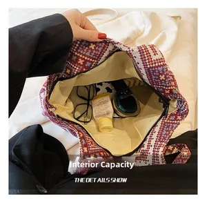 Internal capacity view of a bohemian knit tote bag showing personal essentials inside