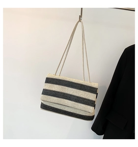 Detail of the high-quality woven texture and black and white stripes on the summer tote bag