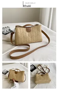Detail view of khaki PU leather tote bag with V-quilted stitching and adjustable straps