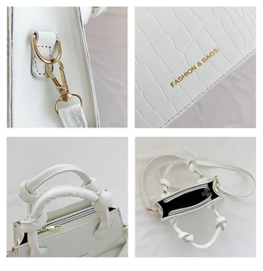 Détails du sac à main blanc motif croco avec boucles dorées et poignée nouée élégante