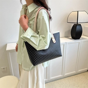Minimalist large tote bag with grey polka dot pattern and white shoulder strap for women