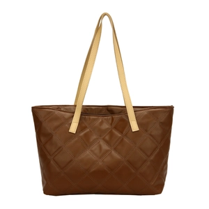 Brown quilted leather tote bag with contrasting cream shoulder straps and large capacity
