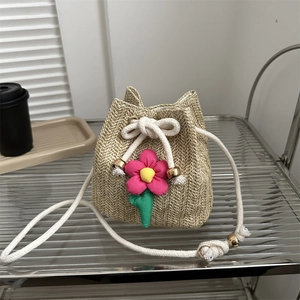 Women's Summer Straw Woven Bucket Bag Sweet Ladylike Flower Decor Drawstring Shoulder Bag Vacation Beach Small Crossbody Bag