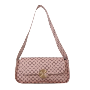 Sac sous les bras rose avec motifs géométriques et fermoir en métal doré en spirale