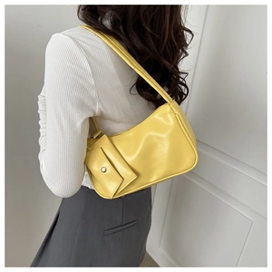 Bright yellow faux leather underarm bag with a matching mini coin purse detail