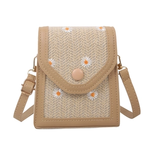 Straw woven crossbody phone bag with embroidered daisies and khaki faux leather trim
