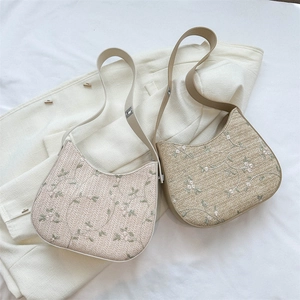 Summer straw shoulder bags with floral embroidery and crescent shape design