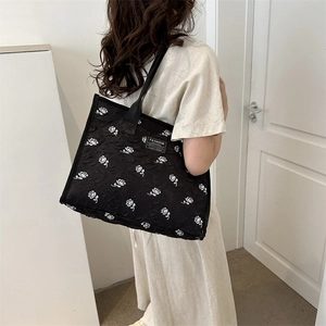 Large capacity black jacquard tote bag with white rose patterns and fashion label