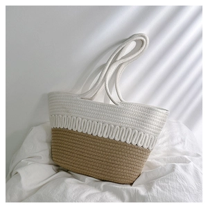 Detail of handwoven large tote bag featuring two-tone contrast and wavy texture