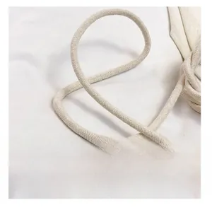 Detail of premium off-white woven rope shoulder strap showing dense twill texture