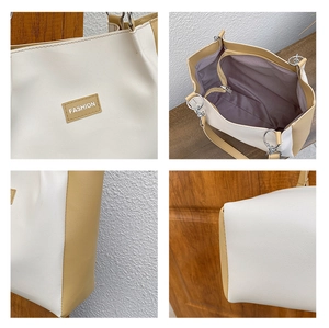 Vue détaillée du grand sac cabas avec design bicolore en similicuir et poche intérieure
