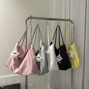 Chic soft PU leather tote bags in five colors with cute plush eye charms and long straps