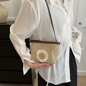 Summer beige straw woven crossbody bag with white sunflower decoration and brown strap