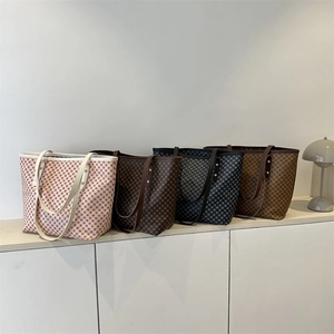 Minimalist large capacity tote bags in four colors with geometric grid patterns