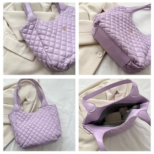 Detailed views of light purple quilted tote bag with diamond stitching and golden logo