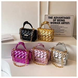 Group of five metallic quilted handbags with pleated handles and chunky gold chains