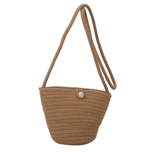 Fashionable khaki woven straw handbag with flower details and white pearl button closure