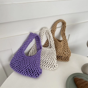 Handmade woven mesh tote bags in purple, cream, and brown for beach or casual use