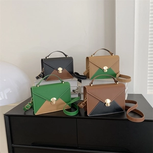 Minimalist color-block envelope crossbody bags with gold rotary lock and top handle