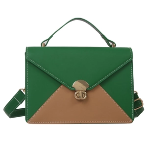 Green and brown contrast leather crossbody bag with envelope flap and gold twist lock