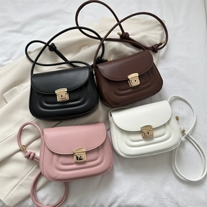 Minimalist solid color shoulder bags with metal locks and decorative knotted straps