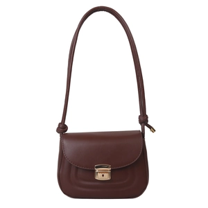 Minimalist deep brown vintage leather shoulder bag with gold clasp and knot strap