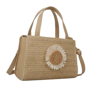 Minimalist straw shoulder bag with white flower decoration and beige PU leather details