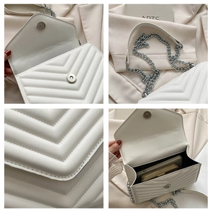 Detail shots of white V-quilted faux leather bag showing silver chain and magnetic closure
