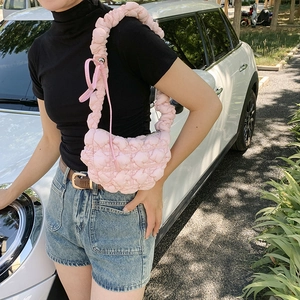Pink quilted bubble hobo bag with pleated shoulder strap and side bows in Korean style