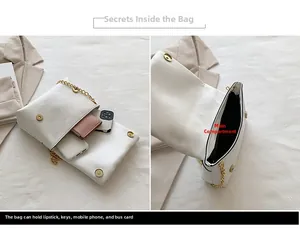 Detailed interior of a white bubble crossbody bag showing main compartment and storage capacity