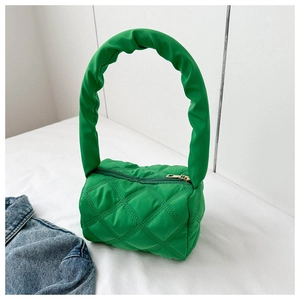 Green quilted nylon handbag with round puffy handles and a top metal zipper detail