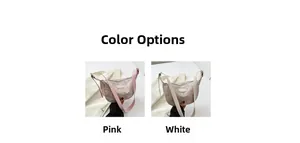 Close-up of pink and white floral pattern crossbody bags with wide shoulder straps