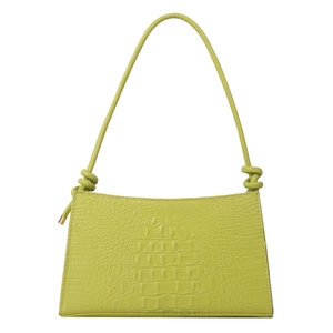 Sac à bandoulière vert texture crocodile avec détail de poignée nouée élégant et moderne