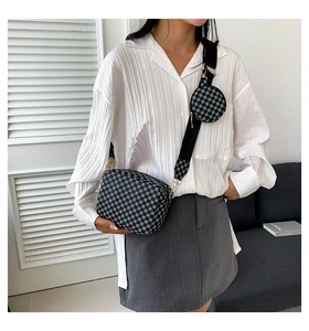 Detail of a two-in-one crossbody bag set with checkerboard pattern and round coin pouch
