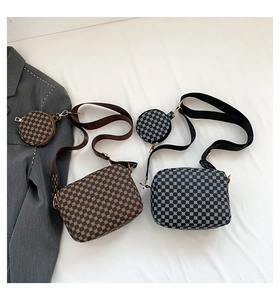 Close-up of printed crossbody camera bags with geometric patterns and round coin purses