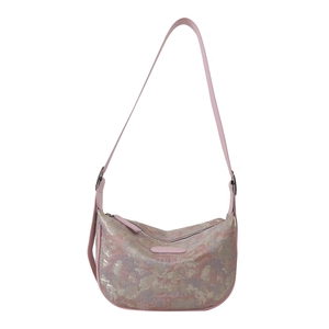 Pink floral embroidery crossbody dumpling bag with shiny metallic fabric and leather strap