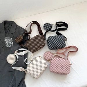 Set of four printed crossbody bags with geometric patterns and wide shoulder straps