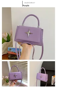 Detail of purple square bag with silver star buckle and woven handle in lifestyle setting