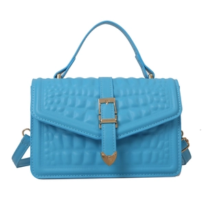 Sky blue crocodile pattern top handle bag with gold hardware and shoulder strap