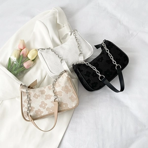Three elegant pleated flower pattern shoulder bags in black, white and beige colors