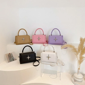 Fashionable women's mini square handbags in five colors with star decor and woven handles